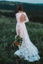 Backless wedding dress with shaped cut from behind by Anna Skoblikova