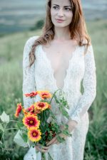 Backless wedding dress with shaped cut from behind by Anna Skoblikova