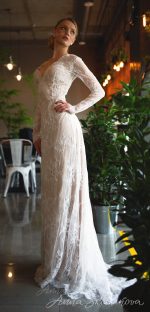 Ivory wedding dress with v-neck cut and open back by Anna Skoblikova