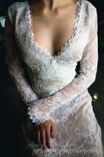 Ivory wedding dress with v-neck cut and open back by Anna Skoblikova