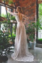 Ivory wedding dress with v-neck cut and open back by Anna Skoblikova