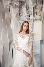 Open-back wedding dress with the fluffy skirt by Anna Skoblikova