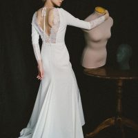 Elegant wedding dress of costume crepe and Chantilly lace