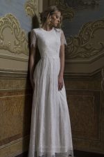 Bella - Wedding dress made from two lace types stands out for its modesty and charm - Anna Skoblikova