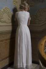 Bella - Wedding dress made from two lace types stands out for its modesty and charm - Anna Skoblikova