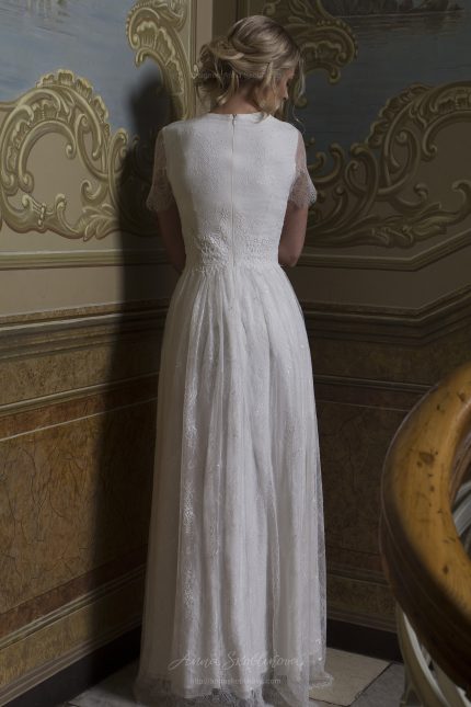 Bella - Wedding dress made from two lace types stands out for its modesty and charm - Anna Skoblikova