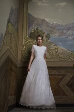 Bella - Wedding dress made from two lace types stands out for its modesty and charm - Anna Skoblikova