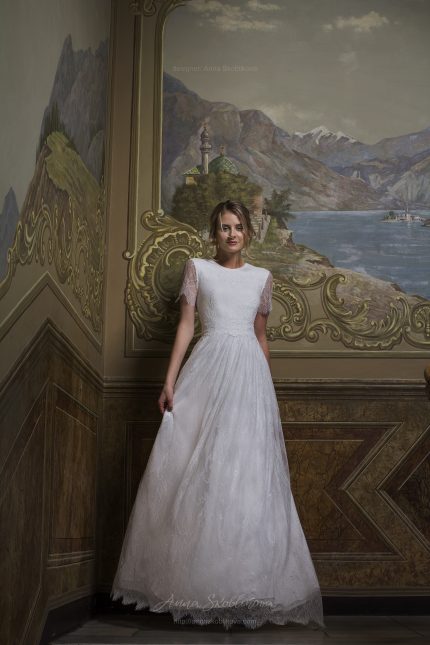 Bella - Wedding dress made from two lace types stands out for its modesty and charm - Anna Skoblikova