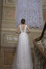 IVANNA – CLASSICAL WEDDING DRESS WITH 3D FLOWERS AND MULTILAYERED TEXTURE MAKES THE BRIDE A FAIRY PRINCESS - Anna Skoblikova