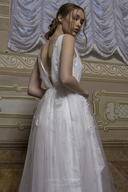 IVANNA – CLASSICAL WEDDING DRESS WITH 3D FLOWERS AND MULTILAYERED TEXTURE MAKES THE BRIDE A FAIRY PRINCESS - Anna Skoblikova