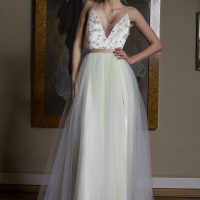 Photo 1: Unique designer wedding dress with a full skirt
